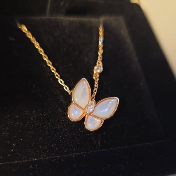 Van Cleef & Arpels Jewelry - Van Cleef & Arpels Gold color chain and White Butterfly Necklace.   .....